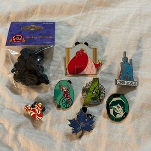 Assorted Disney Parks pins and pin back package